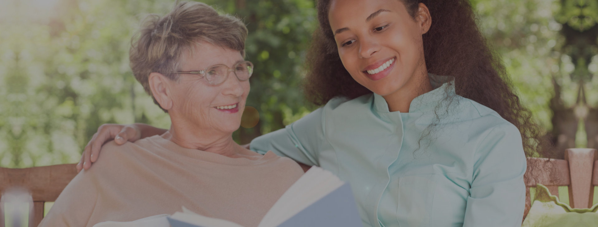 caregiver reading books with her patient